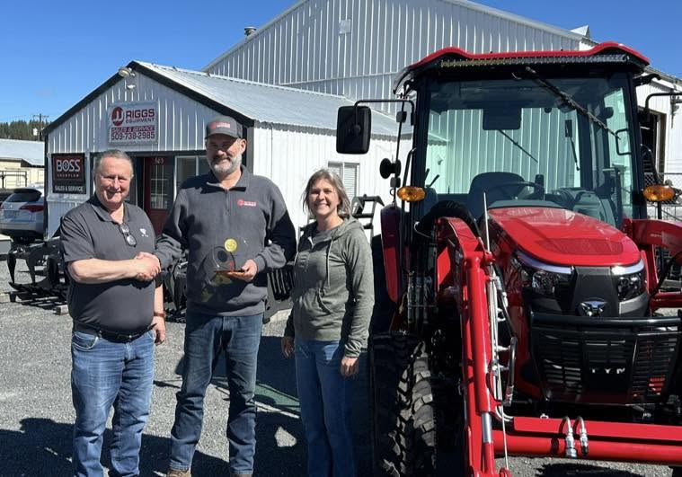 JJ Riggs Equipment team receiving the TYM Gold Dealer award in Colville, WA